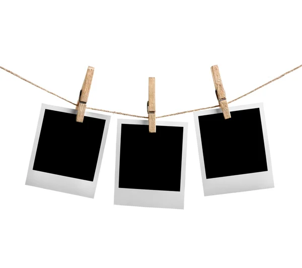 Three instant photos on the clothesline — Stock Photo, Image