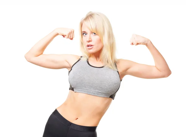 Esporte mulher mostrando seus bicepses — Fotografia de Stock