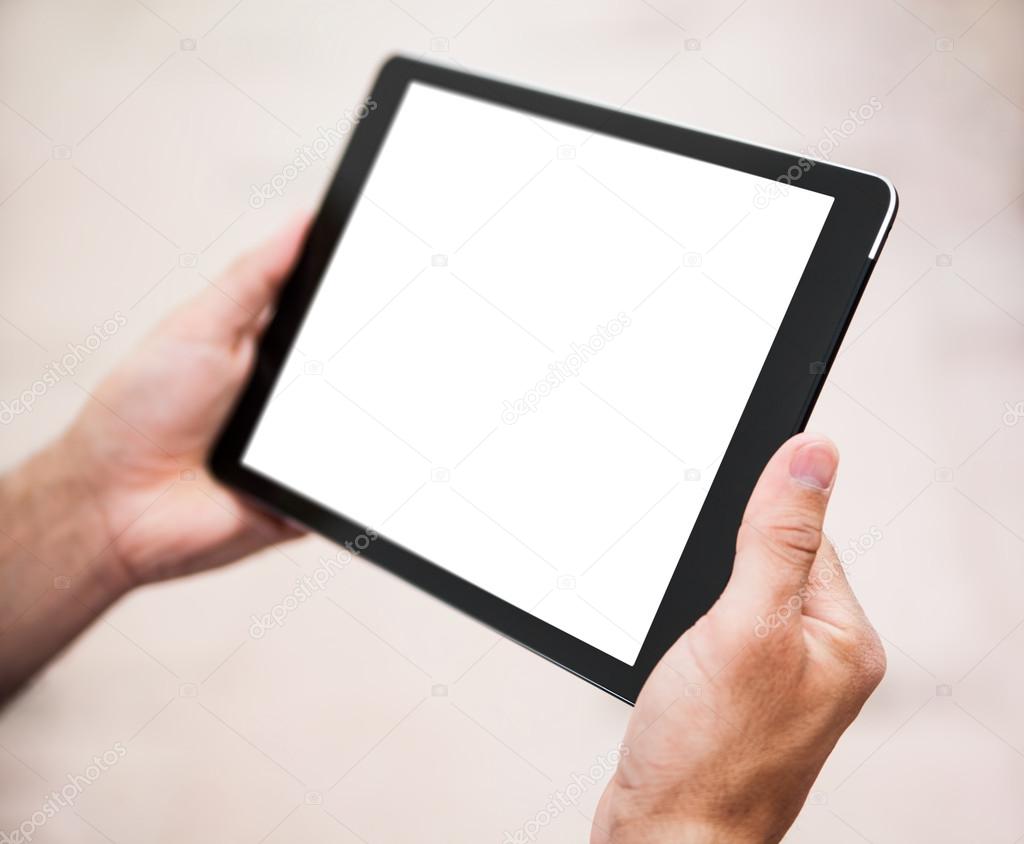 Digital tablet computer in male hands