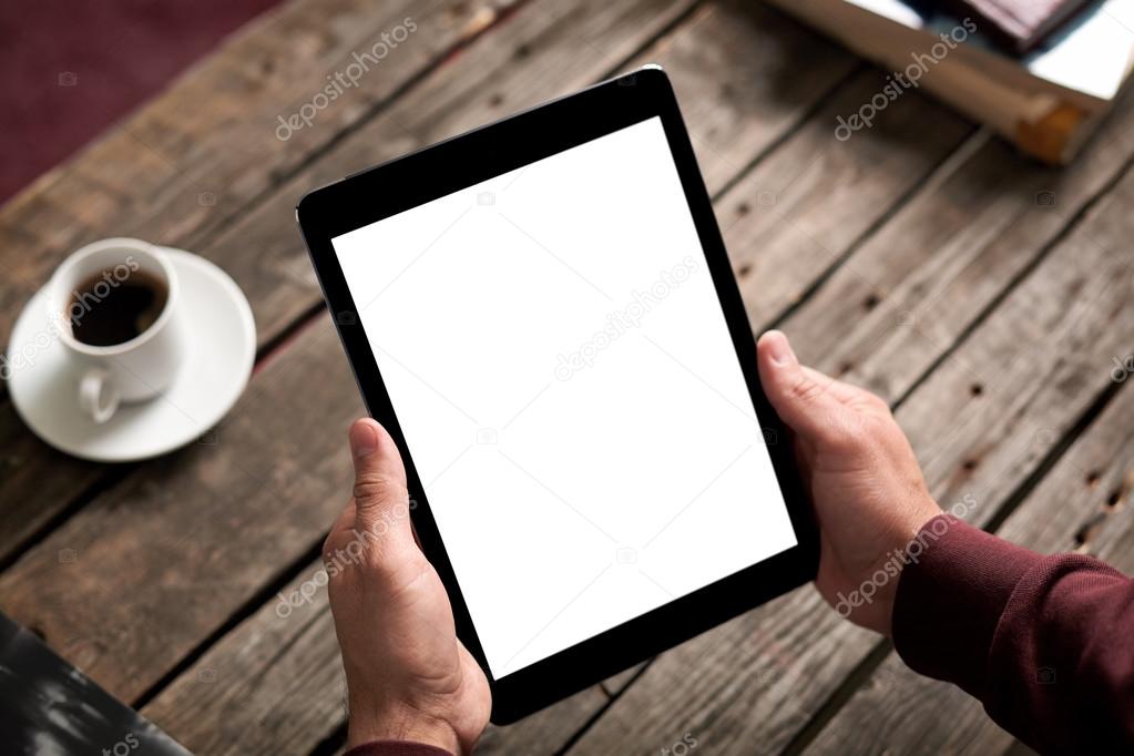 Tablet computer with isolated screen in male hands