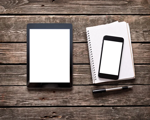 Digital tablet with phablet and notepad — Stock Photo, Image