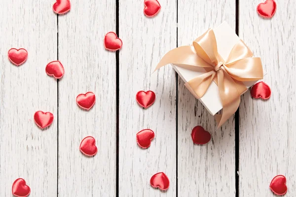 Gift box with small hearts — Stock Photo, Image