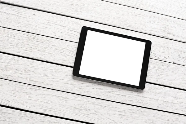 Komputer typu Tablet na białe drewniane biurko — Zdjęcie stockowe