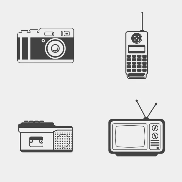 Set of retro monochrome icon. Photo camera, mobile phone, dictaphone, tv set — Stock Vector