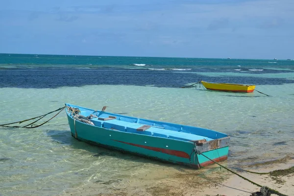 colorful fishing boat anchored on the shore of the beach, local island in theMaldives