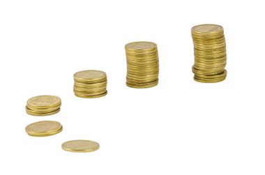 Six stacks of Ukrainian coins isolated on white