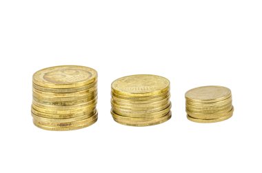 Three stacks of Ukrainian coins isolated on white