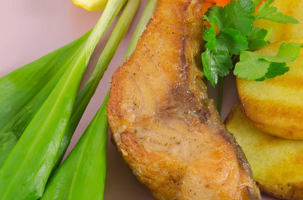 Grilled carp at lilac plate close up — Stock Fotó