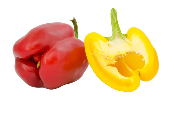 Two peppers red and yellow isolated on white — Stok fotoğraf