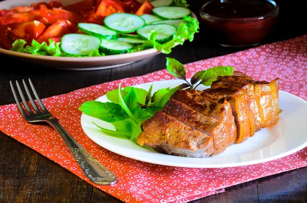 Grilled beef steak with salad and sauce on wooden table — Stock Fotó