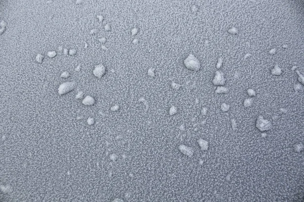 Modelli di neve sulla superficie della macchina in colori chiari — Foto Stock