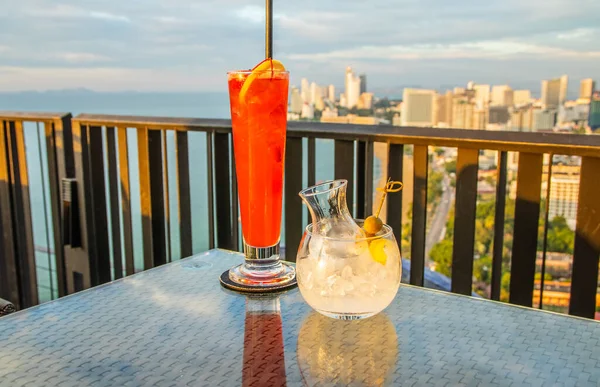 one Singapore Sling and one cosmopolitan cocktail from Thailand Asia