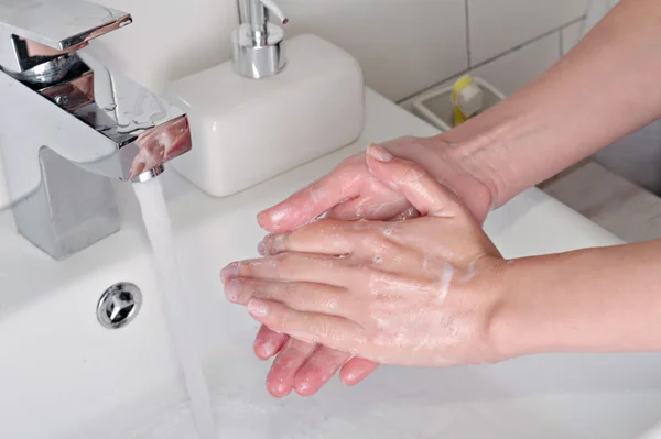 Hygiene concept. Woman washing hands close up — Stock Photo, Image