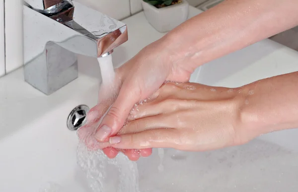 Hygiene concept. Woman washing hands close up — Stock Photo, Image