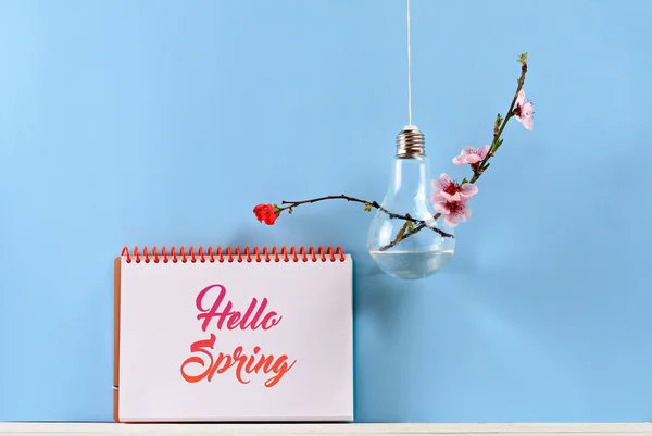 Hello spring poster modern bulb vase with cherry flowers — Stock Photo, Image