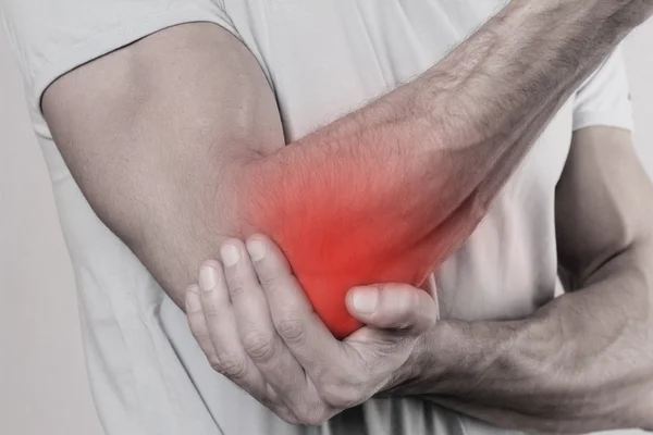Man With Pain In Elbow. Pain relief concept — Stock Photo, Image