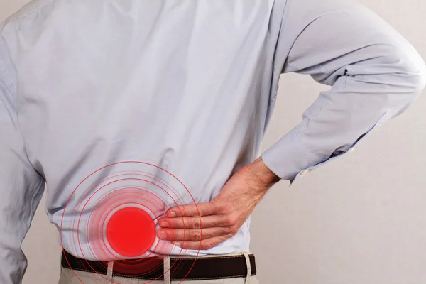 Business man with lower back pain close up. — Stock Photo, Image