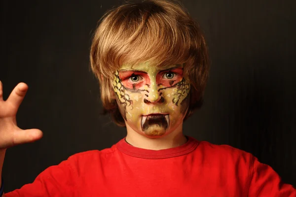 Portrait of 7 years of boy with halloween makeup snake. Children, Kids, Face Painting — Stock Photo, Image