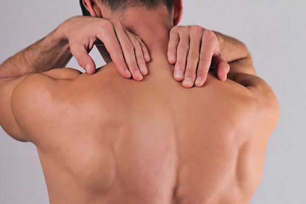 Close up of man rubbing his painful neck. Pain relief concept — Stock Photo, Image