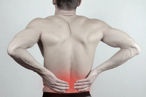 Man with  back pain. Man rubbing his painful back close up. Pain relief concept — Stock Photo, Image