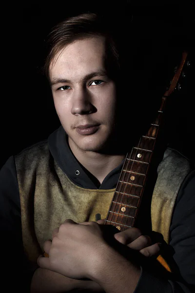 Musician with his favorite guitar — Stock Photo, Image