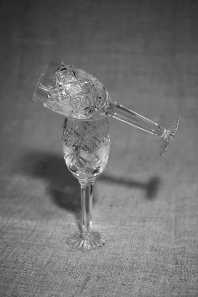 Crystal glass on the table on a gray background — Stock Photo, Image