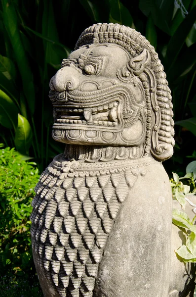 Lion guard at the Thai temple — стоковое фото