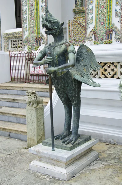 Half bird and human statue at Emerald Buddha Temple — стокове фото