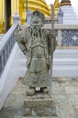 Chinese guardian at Emerald Buddha Temple Bangkok Thailand