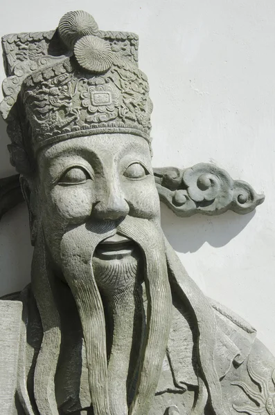 Face of Chinese statue at Wat Pho temple — Stock Photo, Image