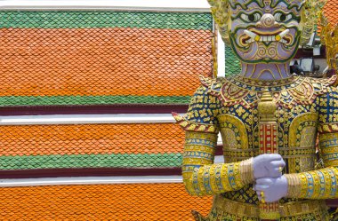 Giant at Emerald Buddha temple Bangkok Thailand.