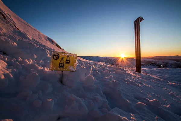 Winter sunrise in the snowy mountains