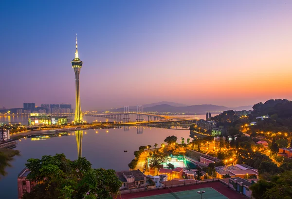 Solnedgången över Macau city skyline — Stockfoto