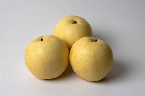 Fresh organic three pear fruit on the white background