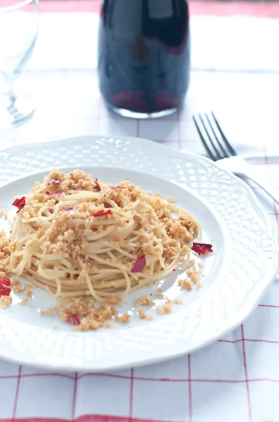 Pasta with anchovies and breadcrumbs, typical of Sicily