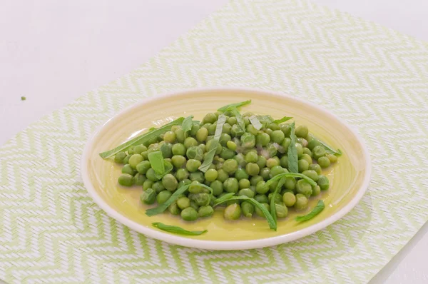 Fresh green peas stews seasoned with mint,italy