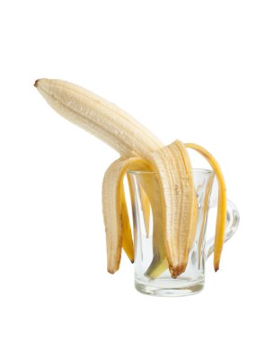 Banana in a glass isolated on white clipart