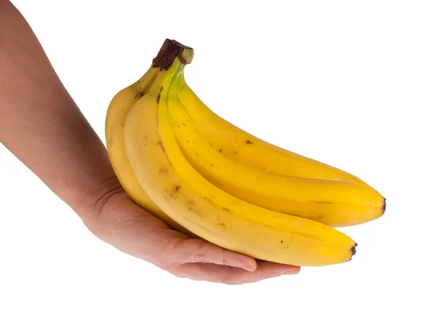 Спелый банан в руке — стоковое фото