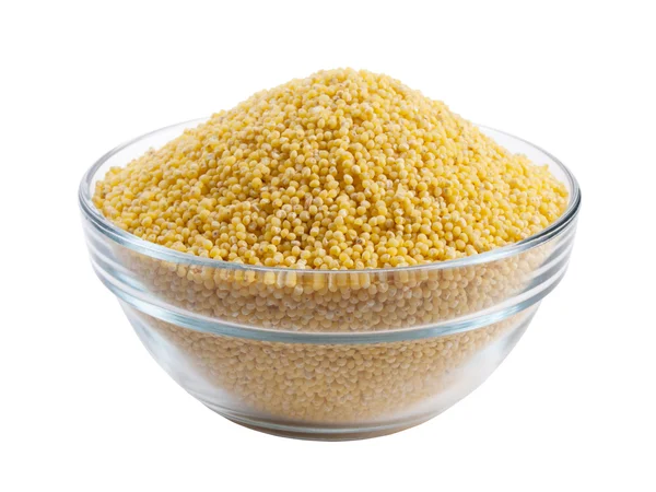 Bowl full of millet on white background Royalty Free Stock Photos