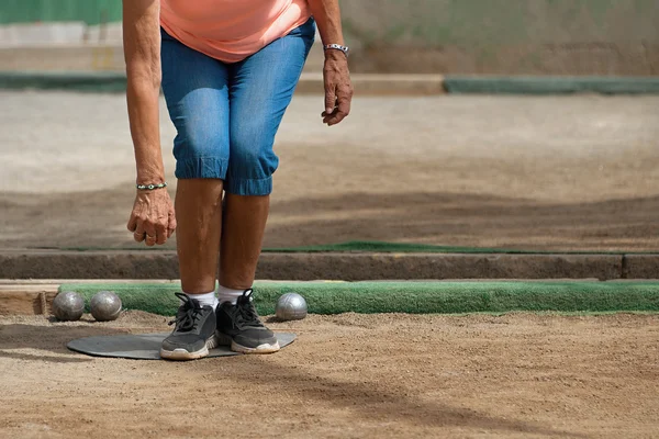 Senior playing petanque — Stock Photo, Image