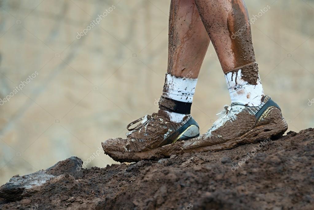Muddy running shoes Stock Photo by ©Pavel1964 109479354