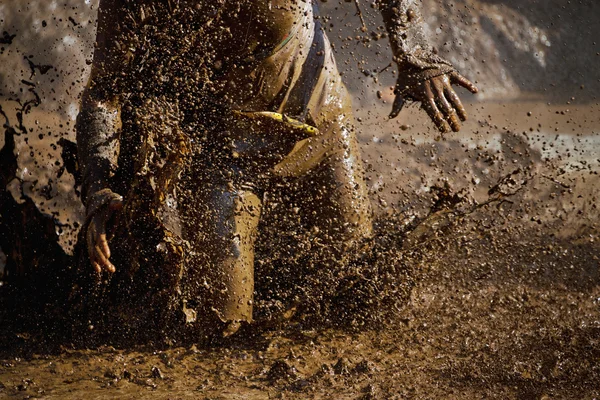 Mud race runners — Stock Photo, Image