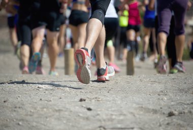Group of active people running