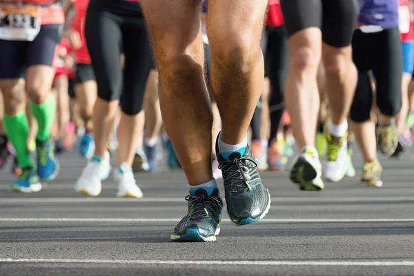 Marathon running race, people feet on city road — Stock Photo, Image