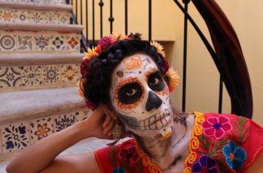 Catrina en la escalera de frante