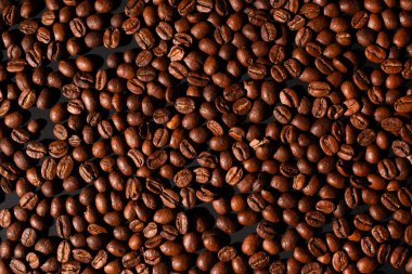 Kahverengi kahve çekirdekleri, arka plan dokusu, yakın plan. Üst Manzara. Yatay yönelim.