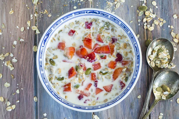 Porridge with milk, pumpkin and fresh fruit — Stock Photo, Image