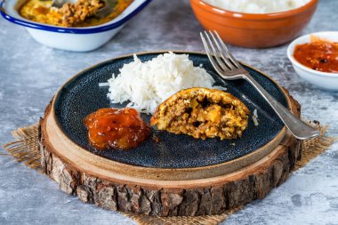 Bobotie - Yumurta bazlı sosla pişirilmiş Güney Afrika körili et
