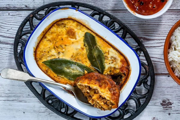 Bobotie - Yumurta bazlı sosla pişirilmiş Güney Afrika körili et