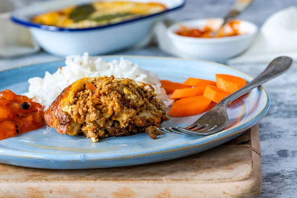 Bobotie - South African curried minced meat baked with egg-based topping